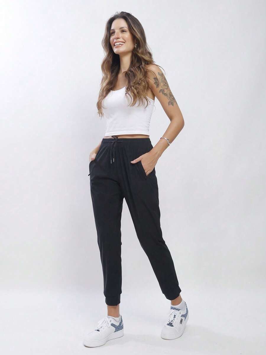 Calça Esportiva Feminina com Elastano – Liberdade e Conforto para Seus Treinos