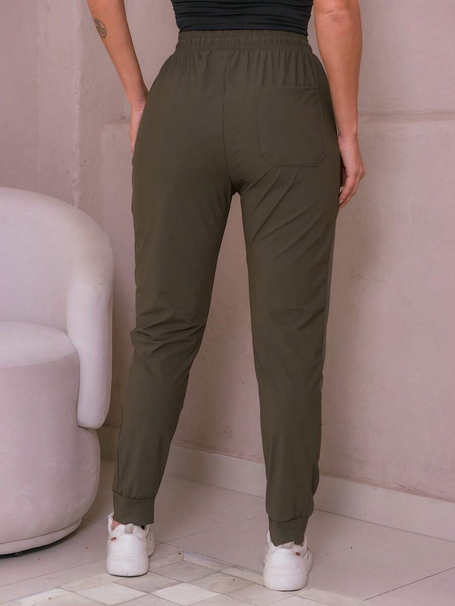 Calça Esportiva Feminina com Elastano – Liberdade e Conforto para Seus Treinos