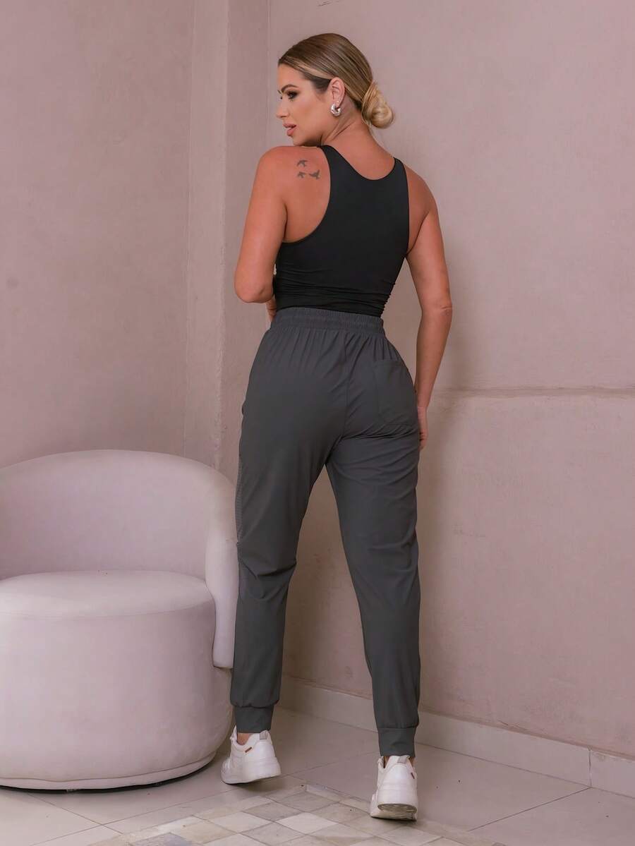 Calça Esportiva Feminina com Elastano – Liberdade e Conforto para Seus Treinos
